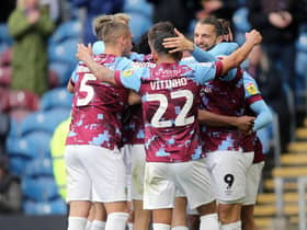 Burnley's Jay Rodriguez (right) celebrates scoring his side's fourth goal with team-mates

The EFL Sky Bet Championship - Burnley v Swansea City - Saturday 15th October 2022 - Turf Moor - Burnley