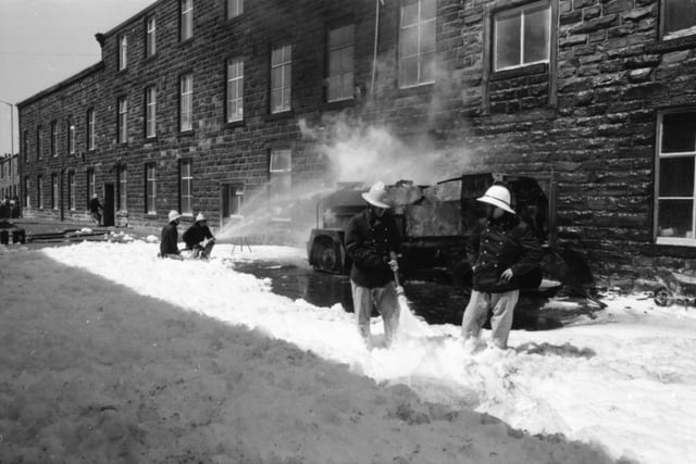 May 20, 1980. Oxford Mill Co, Burnley Road, Harle Syke.

Firemen fought to quell a sea of flames from blazing tar and diesel fuel, which spilled on to the main Burnley Road through Harle Syke during Friday's lunchtime rush period. Police had to divert traffic away from the are for about an hour as two pumps, using a special detergent foam mixture were employed to snuff out the flames. The situation, described as "extremely dangerous while it lasted," developed when a faulty pump on a tar boiler overheated, burst into flames, and set fire to a 49 gallon tank of diesel fuel.