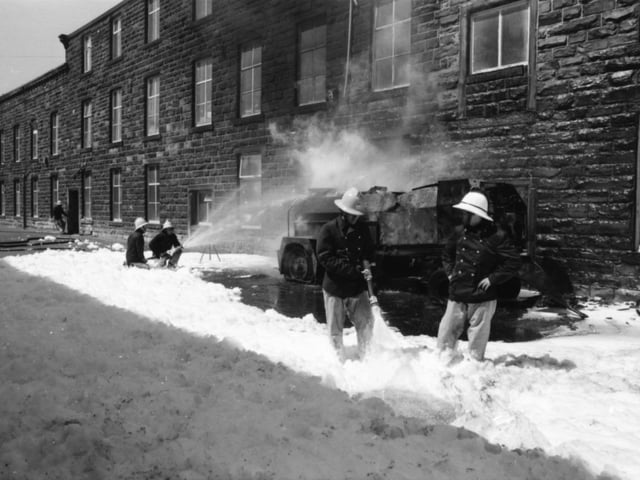 May 20, 1980. Oxford Mill Co, Burnley Road, Harle Syke.
Firemen fought to quell a sea of flames from blazing tar and diesel fuel, which spilled on to the main Burnley Road through Harle Syke during Friday's lunchtime rush period. Police had to divert traffic away from the are for about an hour as two pumps, using a special detergent foam mixture were employed to snuff out the flames. The situation, described as "extremely dangerous while it lasted," developed when a faulty pump on a tar boiler overheated, burst into flames, and set fire to a 49 gallon tank of diesel fuel.