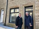Councillor John Harbour (right) with Burnley Council housing officer John Killion outside a newly refurbished property in Burnley