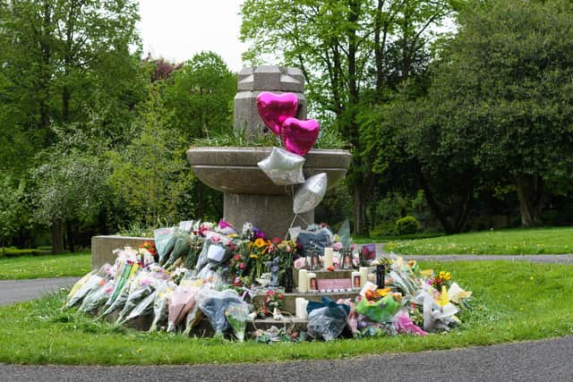 The fountain in Padiham's Memorial Park has become a shrine to mum of two Katie Kenyon after people gathered to lay flowers and tributes there yesterday afternoon.