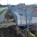 A huge metal walkway, that has been built at the entrance to luxury housing development, The Calders in Red Lees Avenue in Cliviger, has been described as a ‘monstrosity.’