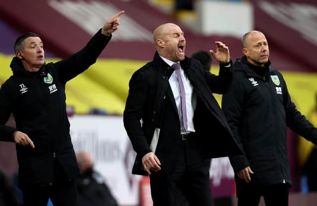 Sean Dyche, manager of Burnley, gives his team instructions during the Premier League match between Burnley and West Bromwich Albion at Turf Moor on February 20, 2021.