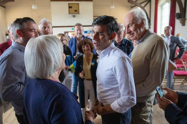 Tory leadership hopeful Rishi Sunak chats to local party members in Clitheroe