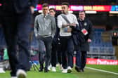 Scott Parker arrives with Quilindschy Hartman before kick-off against Manchester United. Photo: Kelvin Lister-Stuttard