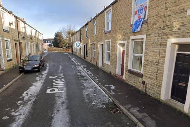 A man has been charged following an aggravated burglary in Pine Street, Burnley