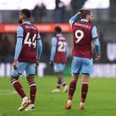 BURNLEY, ENGLAND - FEBRUARY 17: Jay Rodriguez of Burnley and teammates react after conceding the teams fifth goal during the Premier League match between Burnley FC and Arsenal FC at Turf Moor on February 17, 2024 in Burnley, England. (Photo by Matt McNulty/Getty Images)