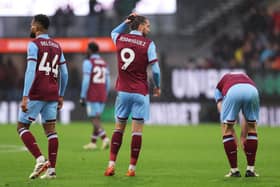 BURNLEY, ENGLAND - FEBRUARY 17: Jay Rodriguez of Burnley and teammates react after conceding the teams fifth goal during the Premier League match between Burnley FC and Arsenal FC at Turf Moor on February 17, 2024 in Burnley, England. (Photo by Matt McNulty/Getty Images)