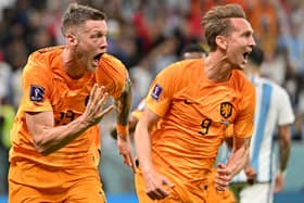 TOPSHOT - Netherlands' forward #19 Wout Weghorst celebrates after scoring his team's second goal during the Qatar 2022 World Cup quarter-final football match between Netherlands and Argentina at Lusail Stadium, north of Doha, on December 9, 2022. (Photo by Alberto PIZZOLI / AFP) (Photo by ALBERTO PIZZOLI/AFP via Getty Images)
