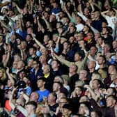HUDDERSFIELD, ENGLAND - JULY 29: Fans of Burnley chant during the Sky Bet Championship match between Huddersfield Town and Burnley at John Smith's Stadium on July 29, 2022 in Huddersfield, England. (Photo by Ashley Allen/Getty Images)