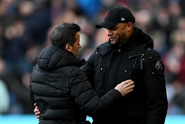 BURNLEY, ENGLAND - FEBRUARY 03: Marco Silva, Manager of Fulham, talks to Vincent Kompany, Manager of Burnley, prior to the Premier League match between Burnley FC and Fulham FC at Turf Moor on February 03, 2024 in Burnley, England. (Photo by Gareth Copley/Getty Images)