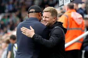 NEWCASTLE UPON TYNE, ENGLAND - SEPTEMBER 30:  Vincent Kompany, Manager of Burnley, embraces Eddie Howe, Manager of Newcastle United, prior to the Premier League match between Newcastle United and Burnley FC at St. James Park on September 30, 2023 in Newcastle upon Tyne, England. (Photo by Ian MacNicol/Getty Images)