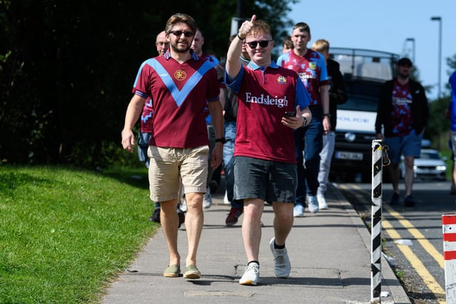 Burnley fans arrive at the DW Stadium ahead of the Wigan v Burnley game. Photo: Kelvin Stuttard