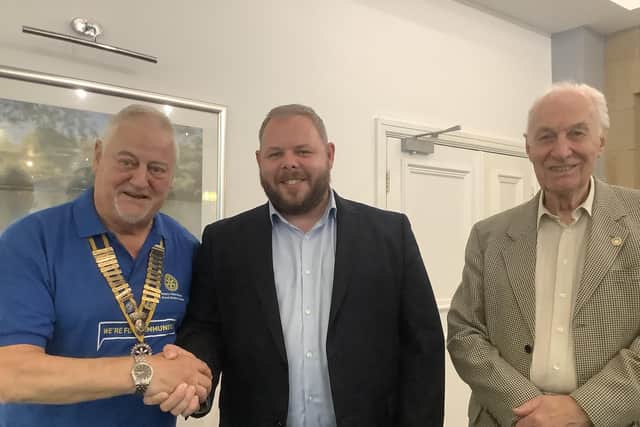 Padiham Rotary president Patrick McGinley and Barry Brown with Burnley MP Antony Higginbotham