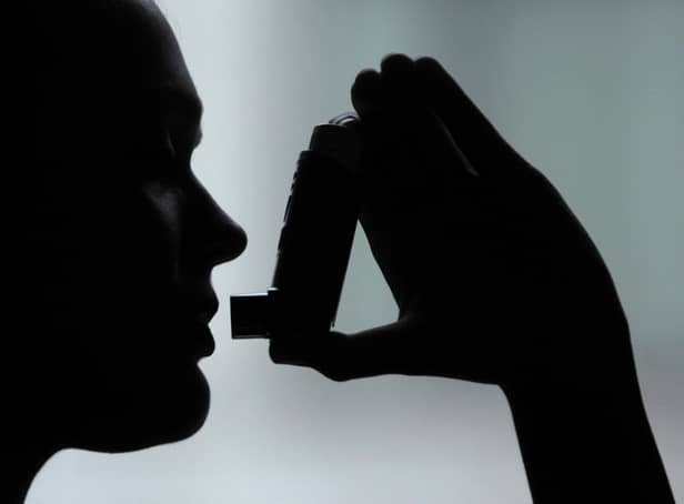 PICTURE POSED BY MODEL.
Photo of a person using an inhaler to take salbutamol to treat asthma. PRESS ASSOCIATION Photo. Photo credit: Clive Gee/PA Wire