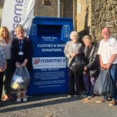 Village hall committee members, including Mary Harrison (fifth from the left) and Chipping villagers, along with the charity’s fundraising manager Sue Swire (fifth from the right,)and volunteer Bob Tuffnell (third from the left) make the first donations to Rosemere Cancer Foundation’s first ever clothing and shoes recycling bank