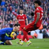 LIVERPOOL, ENGLAND - FEBRUARY 10: James Trafford of Burnley saves from Luis Diaz of Liverpool during the Premier League match between Liverpool FC and Burnley FC at Anfield on February 10, 2024 in Liverpool, England. (Photo by Justin Setterfield/Getty Images)