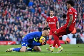 LIVERPOOL, ENGLAND - FEBRUARY 10: James Trafford of Burnley saves from Luis Diaz of Liverpool during the Premier League match between Liverpool FC and Burnley FC at Anfield on February 10, 2024 in Liverpool, England. (Photo by Justin Setterfield/Getty Images)