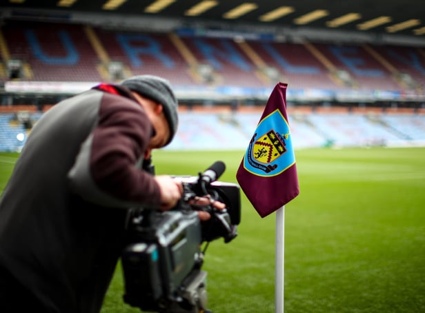 A television cameraman films prior to the Premier League match between Burnley FC and Wolverhampton Wanderers at Turf Moor on March 30, 2019 in Burnley, United Kingdom.