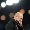 Sean Dyche, manager of Burnley, looks on during the Premier League match between Everton and Burnley at Goodison Park.