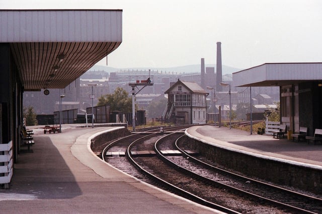 Burnley Central Station with the Watts Mill clock tower in the distance in 1984 before the railway line was singled