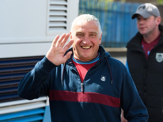 Burnley fans arrive at Turf Moor ahead of the Lancashire Derby with Blackpool. Photo: Kelvin Stuttard