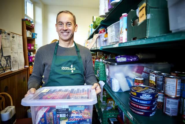 Ribble Valley Foodbank Manager Pete Simm preparing food parcels. Barratt Homes have made a Community Fund donation to Ribble Valley Food Bank at Trinity Methodist Church Community Hub, Clitheroe