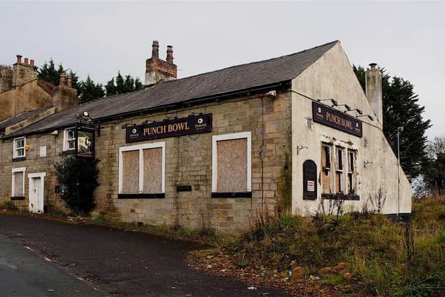 The former Punch Bowl Inn at Hurst Green had been closed and derelict for many years