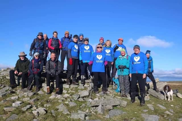Jackie Gallimore, of Whalley, and fellow trekkers at the top of a peak.