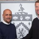Longwell, right, is welcomed to the club by Paul Jenkins. Picture: Burnley FC