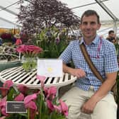 Matthew Smith of Brighter Blooms at Walton le Dale celebrates gaining a gold medal in the Floral Marquee awards for his display of Zantedeschias (also known as Calla lilies)  Photo:Fiona Finch