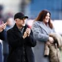 BURNLEY, ENGLAND - FEBRUARY 03: Alan Pace, Owner of Burnley applauds prior to the Premier League match between Burnley FC and Fulham FC at Turf Moor on February 03, 2024 in Burnley, England. (Photo by Naomi Baker/Getty Images)