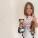 Florence Whitehead (six) donated 11-and-a-half inches of her hair to the Little Princess Trust and also raised £1,229 for the charity that makes wigs for children with cancer