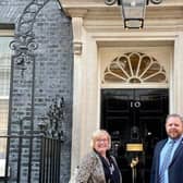 Reporter Sue Plunkett on the steps od Number 10 Downing Street with Burnley MP Antony Higginbotham