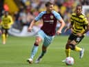 Watford's Brazilian striker Joao Pedro (R) vies with Burnley's English defender James Tarkowski (L) during the English Premier League football match between Watford and Burnley at Vicarage Road Stadium in Watford, north-west of London, on April 30, 2022.