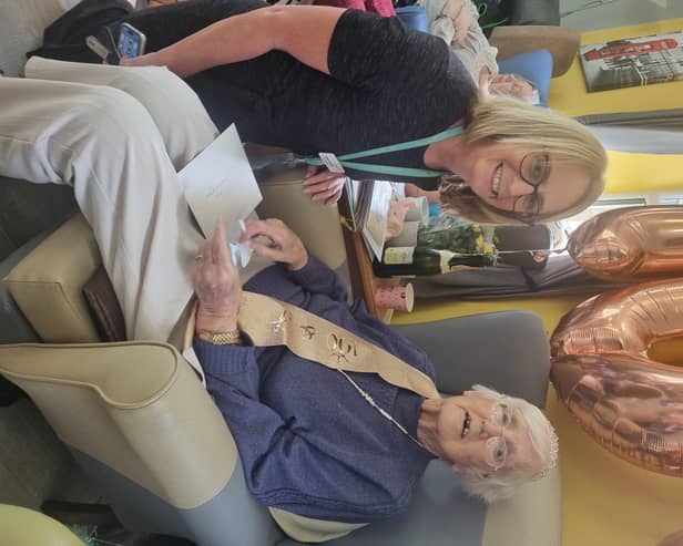 Helen McVey, who is chief executive of Pendleside Hospice, congratulates Dorothy Woodhead on her 100th birthday. Dorothy was one of the 'Crowther Street Mob' who helped to raise £100,000 to make the hospice become a reality in 1988