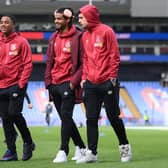 Assignon (pictured centre) joined Burnley on loan during the January transfer window from Rennes on a deal until the end of the season. Chief operating officer Matt Williams recently revealed the deal included an option to buy the right-back at the end of the season.