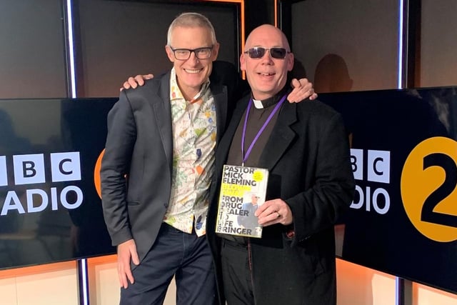 He is a former addict and drug dealer who turned his back on crime after finding God.
Pastor Mick Fleming, pictured (right) with Jeremy Vine on the journalist's BBC Radio 2 lunchtime programme, founded Church on the Street in Burnley to help the impoverished, addicted, and homeless.
Trauma from being raped in his youth by a stranger and losing his older sister led him to drugs, and a life of crime helped feed his habit.
One day, working as a drug dealer and waiting to shoot a man who came out of a gym with his two small children, he had a spiritual epiphany that led him to God and a mission to help the most vulnerable.
During this mission, Pastor Mick came across the man who sexually assaulted him and helped him recover from alcoholism and reunite with his family.
He then caught the attention of the Royals when 50 million people watched a BBC news report about his work delivering necessities to desperate Burnley families during the pandemic.
Support came from Prince William, who visited the charity last year and even wrote the foreword to Pastor Mick's Amazon best-selling autobiography.
While the charity offers a food bank, counselling, medical care, an addiction support group, and more, locally, the pastor has also used his platform to keep the town's struggles with poverty, addiction, and homelessness in the global headlines and strengthen its connections with the royals. As a result, the charity has expanded into a second building.