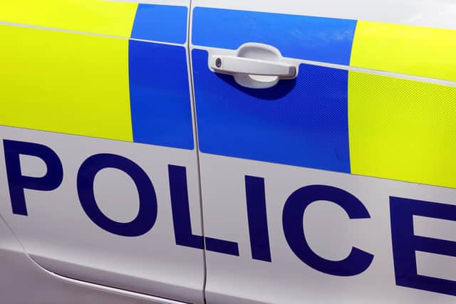 Investigation underway after the death of woman in East Lancashire.