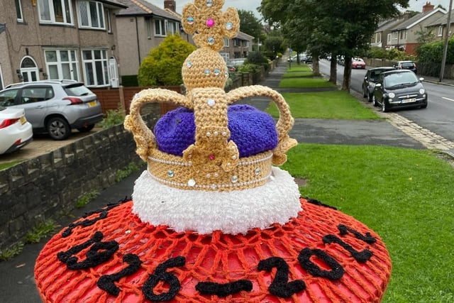 This eye catching postbox topper of a royal crown was lovingly crocheted by the Barlick Yarn Fairies and is on display in Colne.