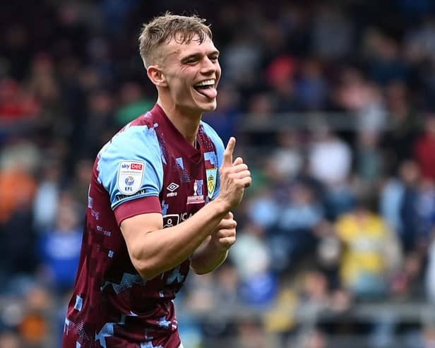 BURNLEY, ENGLAND - MAY 08: Scott Twine of Burnley celebrates after scoring the team's third goal from a free kick during the Sky Bet Championship between Burnley and Cardiff City at Turf Moor on May 08, 2023 in Burnley, England. (Photo by Gareth Copley/Getty Images)