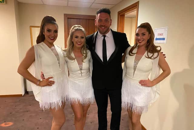 Josh Hindle with Jane McDonald's backing singers and dancers The Blue Birds