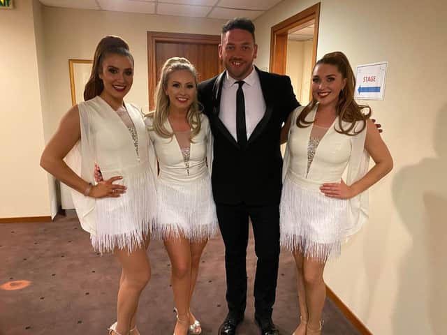 Josh Hindle with Jane McDonald's backing singers and dancers The Blue Birds