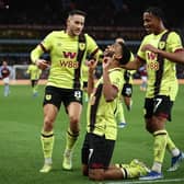 BIRMINGHAM, ENGLAND - DECEMBER 30: Lyle Foster of Burnley celebrates with teammates after scoring their team's second goal during the Premier League match between Aston Villa and Burnley FC at Villa Park on December 30, 2023 in Birmingham, England. (Photo by Ryan Pierse/Getty Images)