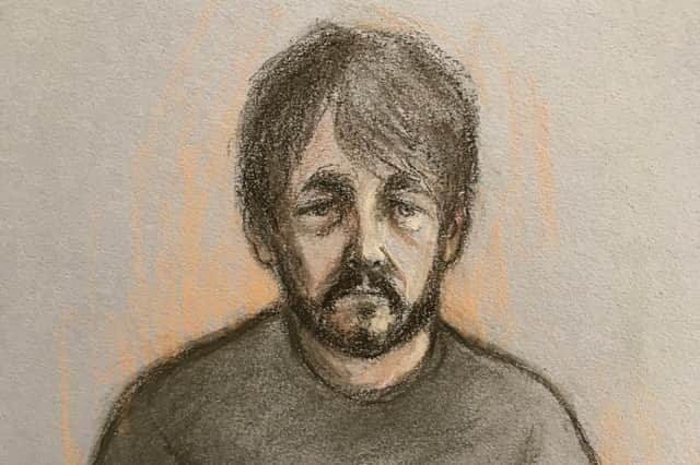 A court artist sketch by Elizabeth Cook of Andrew Burfield appearing by video-link from HMP Preston at Preston Crown Court