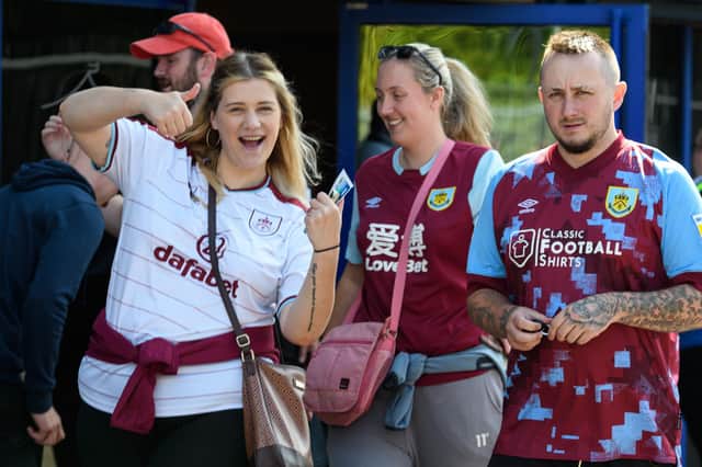 Burnley fans arrive at the DW Stadium ahead of the Wigan v Burnley game. Photo: Kelvin Stuttard