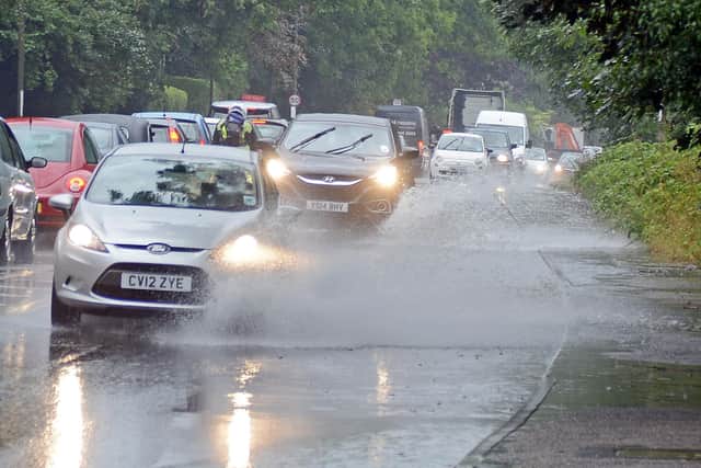 Heavy rain overnight has caused chaos on Burnley's roads and the Environment Agency has issued a number of flood alerts (photos for illustration purposes)