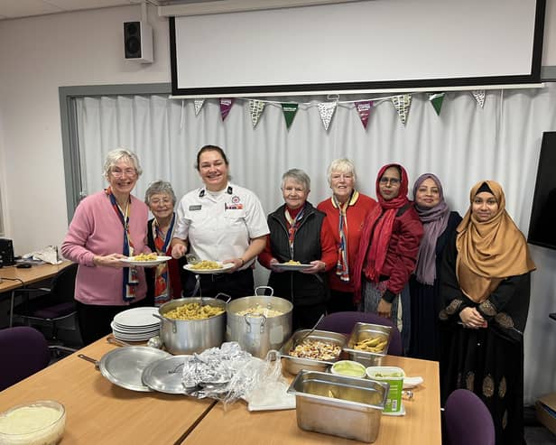 A group of Bengali women, brought together by Age UK Lancashire, met with Trefoil Guild members at Burnley Fire Station