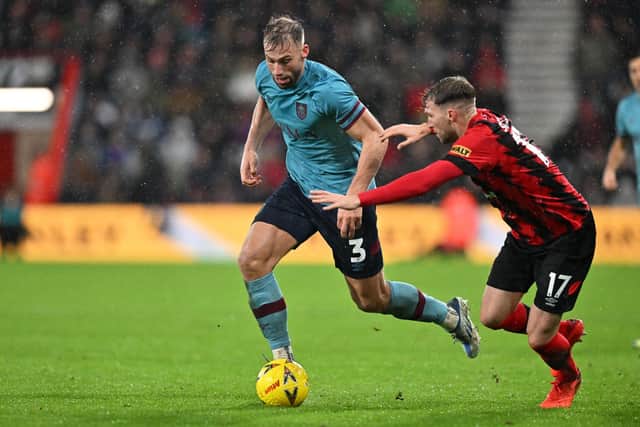 Burnley's English defender Charlie Taylor (L) vies with Bournemouth's English defender Jack Stacey (R) during the English FA Cup third round football match between Bournemouth and Burnley at the Vitality Stadium in Bournemouth, southern England on January 7, 2023.