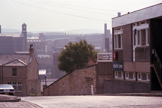 Burnley Central Station  with the Watts Mill clock tower in the distance in 1984 before the railway line was singled